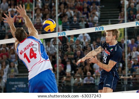 ROME, ITALY - OCTOBER 10: Italy Ivan Zaytsev spikes ball at Volleyball World Championships bronze medal match Italy vs Serbia at Palalottomatica in Rome on October 10, 2010