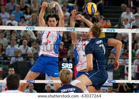 ROME, ITALY - OCTOBER 10: Italy Michal Lasko spikes ball at Volleyball World Championships bronze medal match Italy vs Serbia at Palalottomatica in Rome on October 10, 2010
