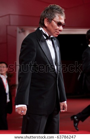 VENICE, ITALY - SEPTEMBER 9: director Takashi Miike on red carpet for movie premiere of  \