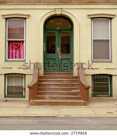 Green front door, stoop, and sidewalk.  Philadelphia, PA.