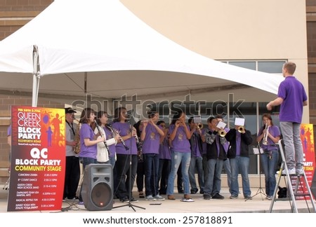 QUEEN CREEK, ARIZONA/USA - FEBRUARY 28: Unnamed members of the Queen Creek High School SPILLED band perform on February 28, 2015 at the newly reopened Town Center in Queen Creek, Arizona.
