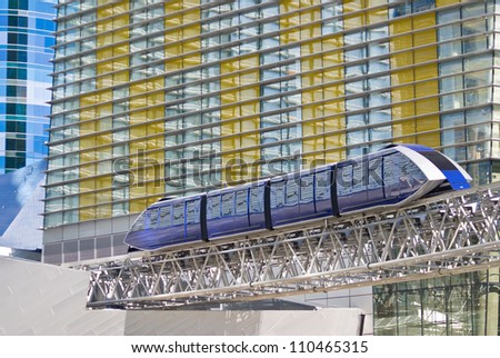 LAS VEGAS - DEC 29, 2009: A modern tram at CityCenter connects the Belaggio, Aria and Monte Carlo hotels and casinos on the Las Vegas Strip on December 29, 2009.