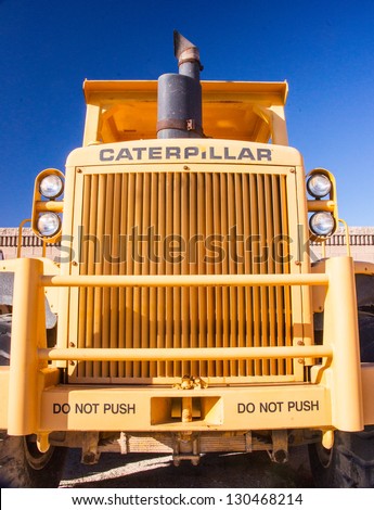 LAS VEGAS - MARCH 1:  New heavy duty Caterpillar 966K front loader at a dealership awaits customers ready to resume construction as the US economy recovers in Las Vegas. Photo taken March 1, 2013..