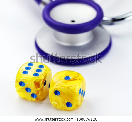 A Doctors Purple stethoscope with two yellow dice with light blue spots dice placed next to it, asking the question, do you gamble with your health.
