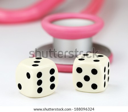 A Doctors Pink stethoscope with two white dice with black spots dice placed next to it, asking the question, do you gamble with your health.