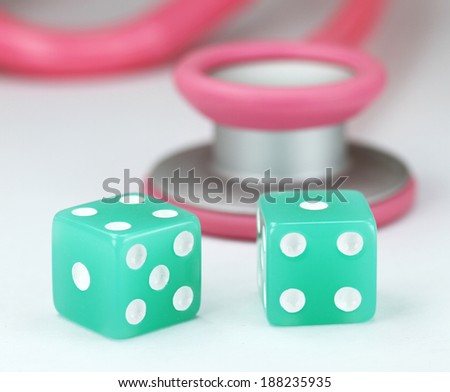 A Doctors Pink stethoscope with two aqua colored dice with black spots dice placed next to it, asking the question, do you gamble with your health.