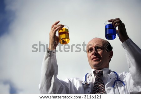 Doctor, wearing laboratory coat  examining a couple of samples against a cloudy white sky