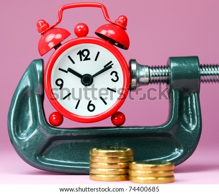 A red alarm clock placed in a Grey clamp against a pastel pink background, with a stack of gold coins in front of it, asking the question do you manage your time effectively?