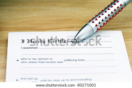 A doctor’s desk showing a ball point pen and sick certificate pad, with the declaration I hereby certify prominent.