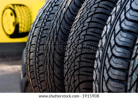 car tires displayed for sale, depicted in an abstract fashion