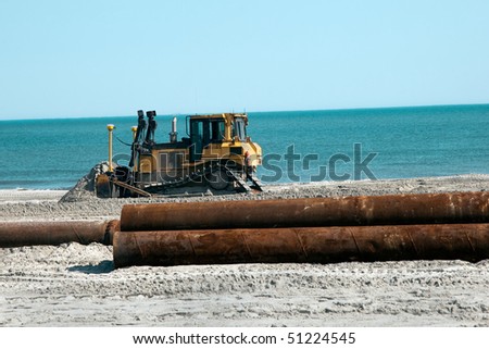 Bulldozer moving Sand