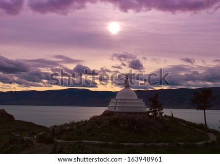 Stupa  buddha in a moonlight on island, Ogoj, lake Baikal