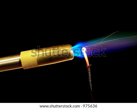 stock-photo-torch-melting-a-copper-wire-975636.jpg
