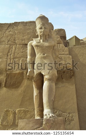 Statue of Pharaoh in the Peristyle Court of the Temple Amon-Ra at Karnak. Valley of Thebes, Luxor, Egypt