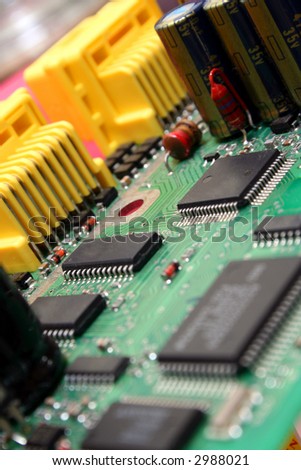 Printed circuit board with various electronics devices assembled on it.