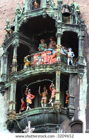 The colorful dolls dancing in the clock of the new town hall building of Marienplatz in Munich, Germany.