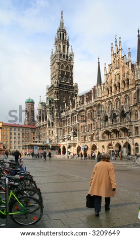 The pedestrian walkway of Marienplatz in front of the new town hall building in Munich, Germany.