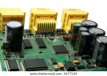 A printed circuit board with various electronic components mounted on it.
