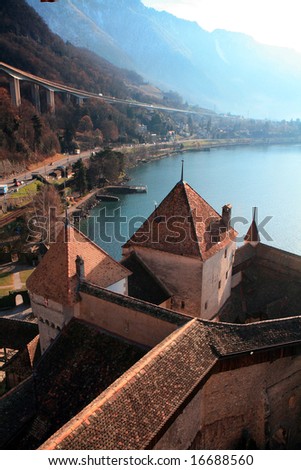 View from the tower of Chillon Castle overlooking Lake Geneva on a misty morning. More of such photos in my portfolio.