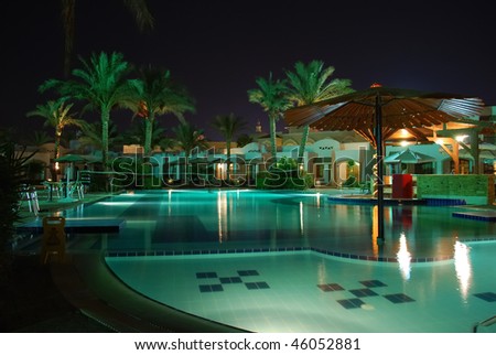 Luxury hotel pool in Egypt by night