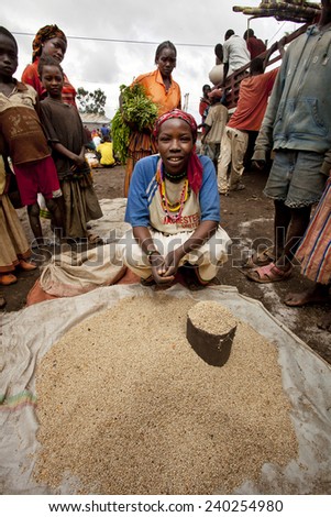Unidentified Girl selling in the Konso tribe market. Africa, south Ethiopia Photo taken 28.12.2009