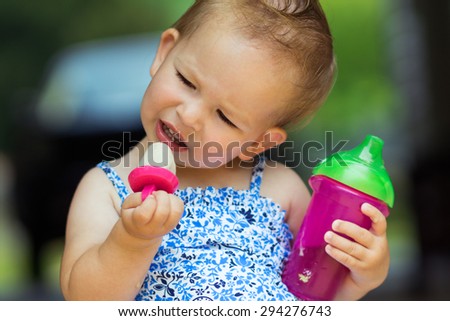 Little girl looking at frozen treat