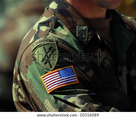 Airborne and USA flag patch on soldiers arm