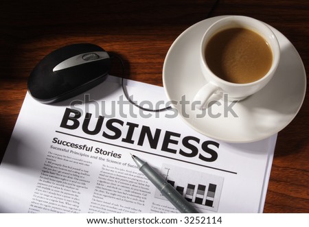 Still life of coffee, mouse pen and business file on table