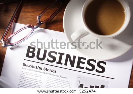 Still life of coffee,glasses and business file on table