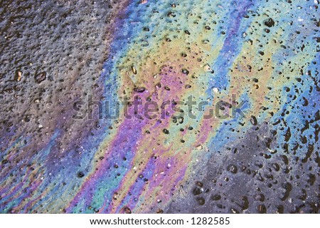 stock-photo-rainbow-reflection-of-an-oil-slick-on-dirty-concrete-1282585.jpg