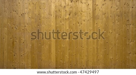 A photo of vertical wood background  planks stacked making a nice background.