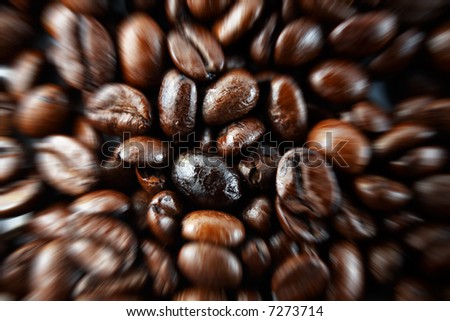 Macro closeup of coffee beans with zoom effect