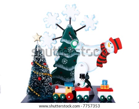 A snowman playing, a christmas tree and a train with gifts