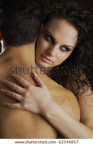 black dating latin man woman. stock photo : woman hugging shirtless man isolated on black