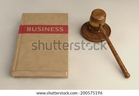 Gavel and Business law book on linen surface. Conceptual illustration