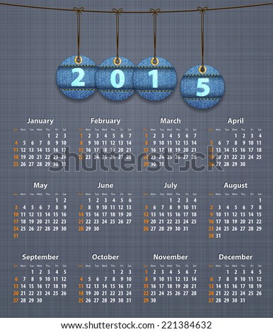 Stylish English calendar for 2015 on linen texture with jeans tags hung on thread
