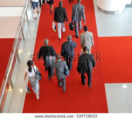 Moving crowd  in a international exhibition. motion blur