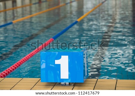Competition swimming pool with starting blocks