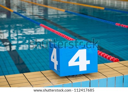 Competition swimming pool with starting blocks