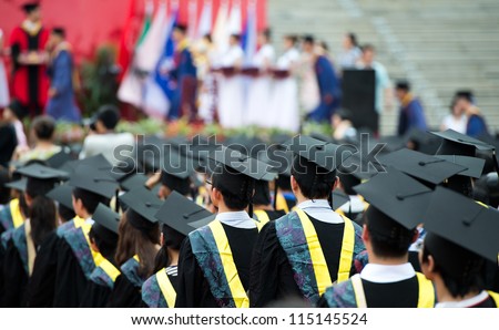back of graduates during commencement.
