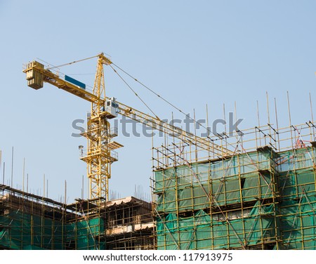Cranes on a construction site in China.