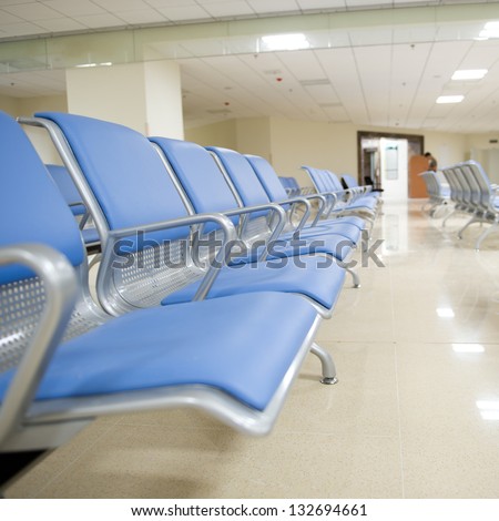 Hospital Waiting Room With Empty Chairs.