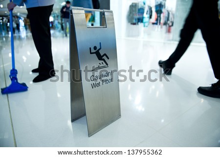 cleaning in progress and wet floor caution sign besides cleaning in progress and wet floor caution sign besides