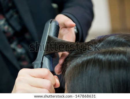 Asian woman at the hairdresser salon