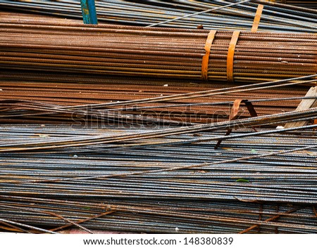 Steel rods or bars used to reinforce concrete.