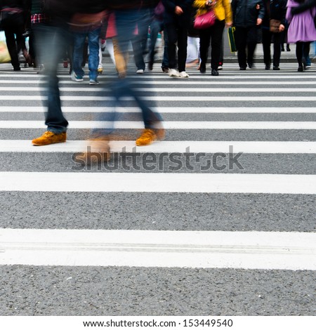 city people walking on big city street. blur motion