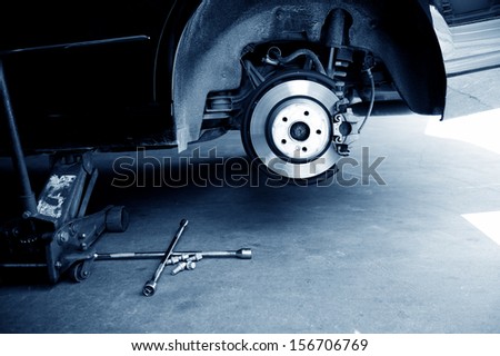 Car without tire need to be repaired.