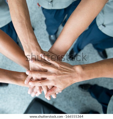 People With Their Hands Together. Team Work Concept