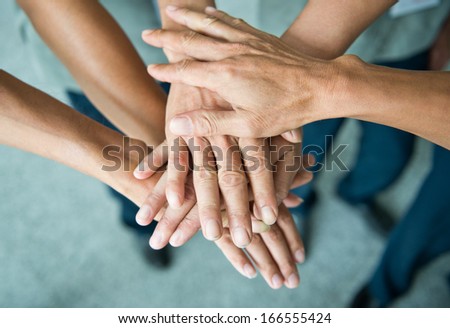 People with their hands together. team work concept