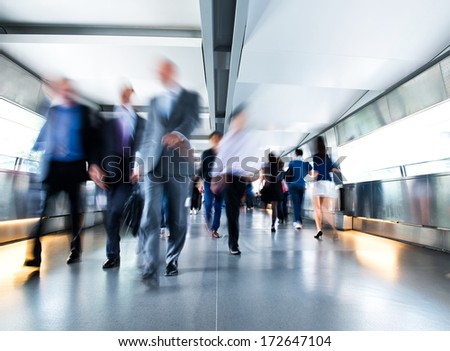 People rushing in the lobby. motion blur